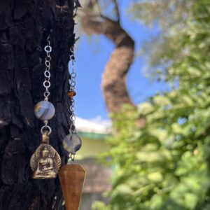 Peach Moonstone Point with Buddha Charm