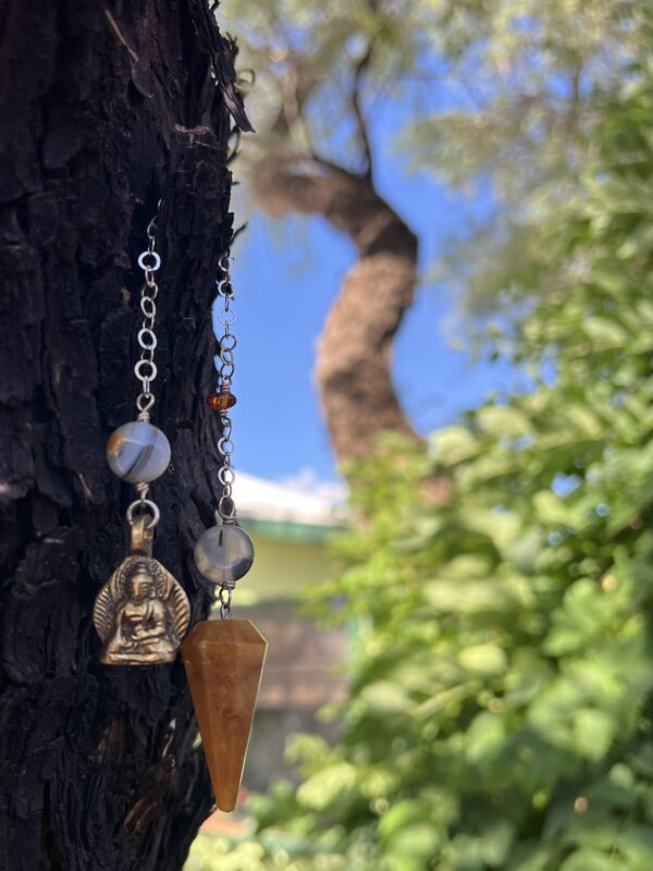 Peach Moonstone Point with Buddha Charm