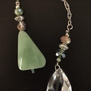 Pendulum-Faceted Clear Glass bead with Triangular Green Glass bead